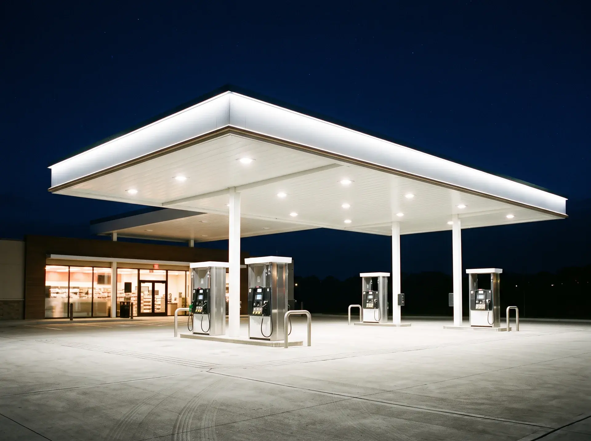 Gas station canopy lit at night